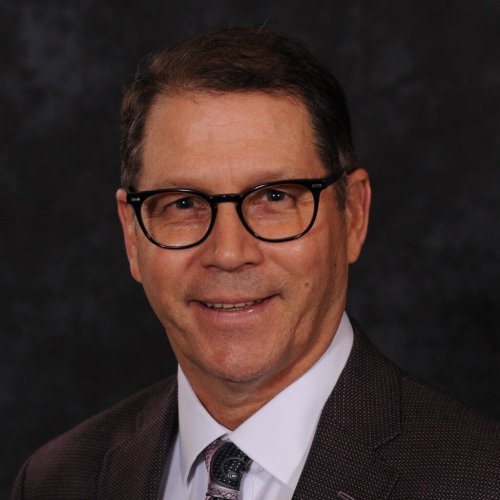 Dr. Tom Adams